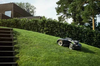 Husqvarna Automower 435X AWD NERA climbing a slope
